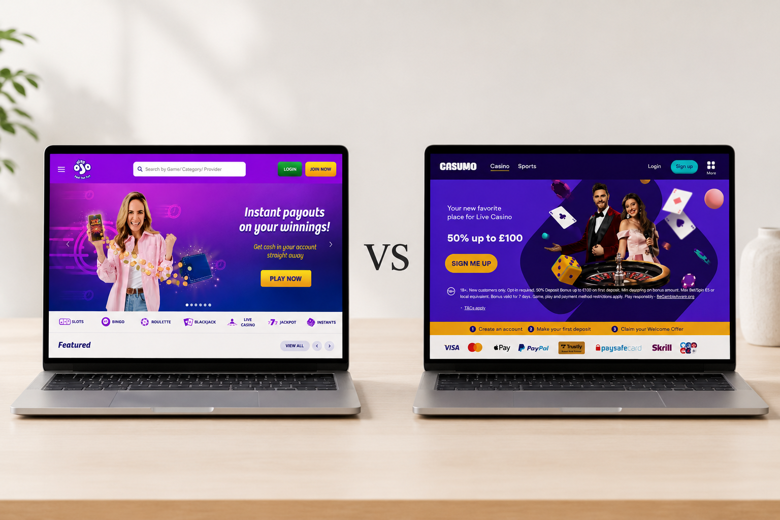 Two laptop screens comparing a purple and a dark-themed website UI on a desk with “VS” between them