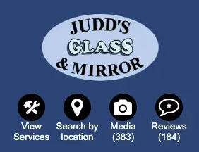 A blue background with judd 's glass and mirror written on it