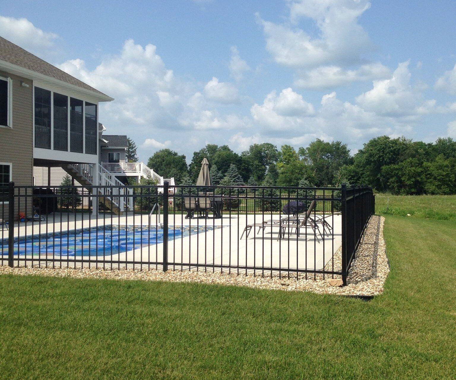 A home with the protection of ornamental iron fencing in Marion, IA