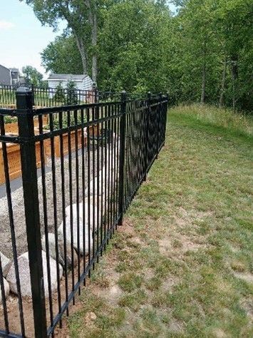 Black Metal Iron fence in front of house