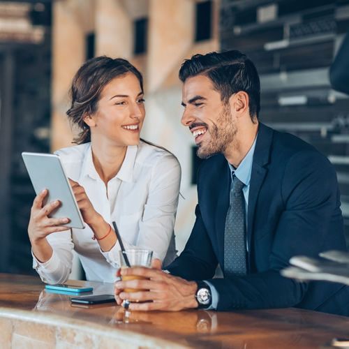 royal realty Lawrenceville Georgia - image of real estate agents reviewing a real estate proposal