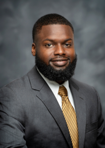 A silhouette of a man 's head in a circle.