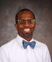 A silhouette of a man 's head in a circle.