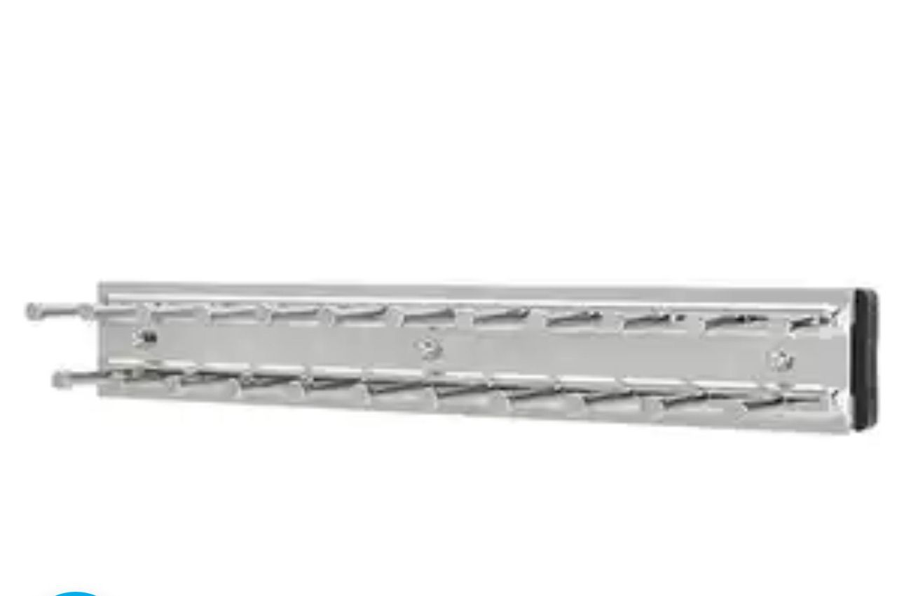 Silver tie rack with multiple angled hooks.
