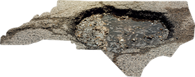 A shape of North Carolina filled with asphalt, depicting a large, water-filled pothole within the state's borders.
