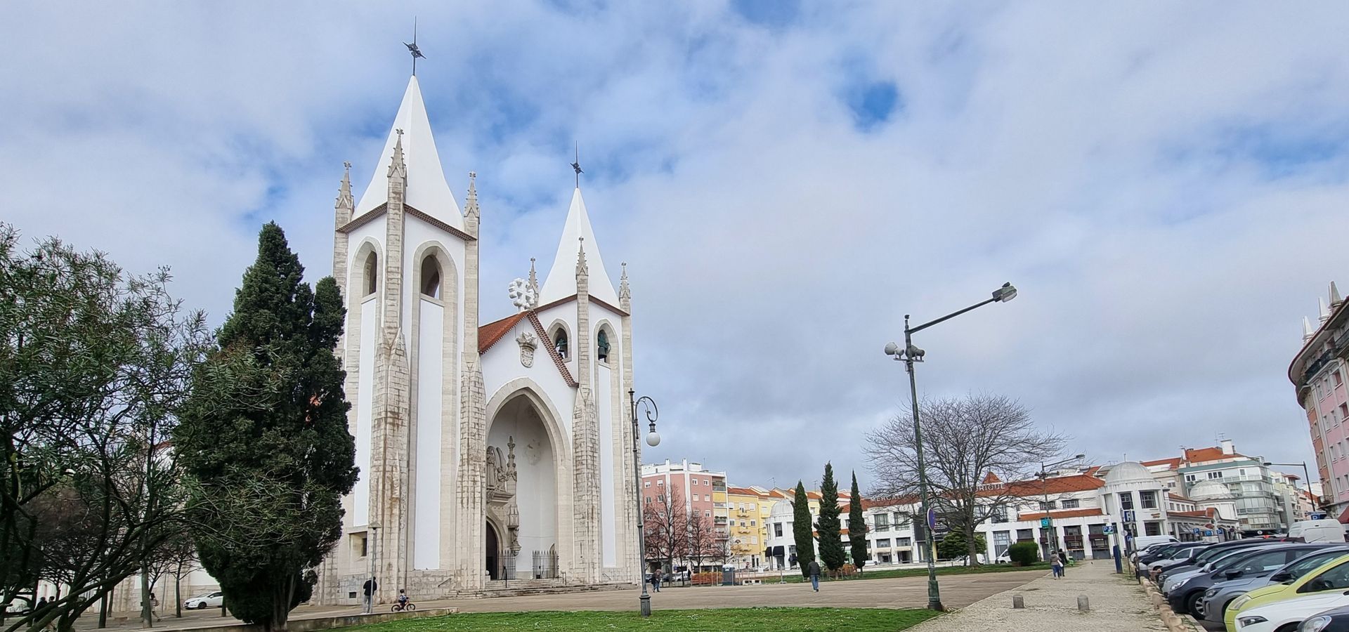 Elegant facade of Santo Condestável Church and Campo de Ourique Market in Campo de Ourique, a cultural landmark near Amoreiras.