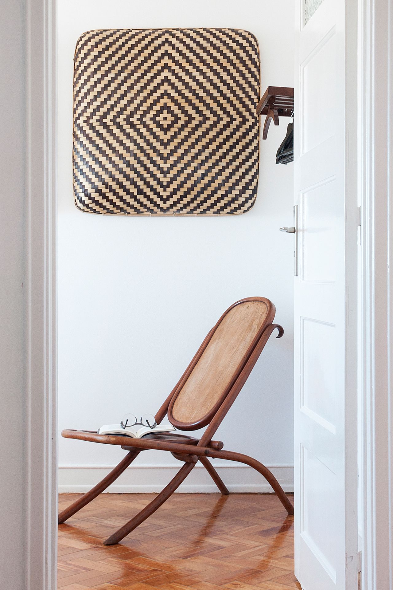 A cozy reading seat in the bedroom — designed for rest, reflection, or quiet moments at Cheese & Wine.