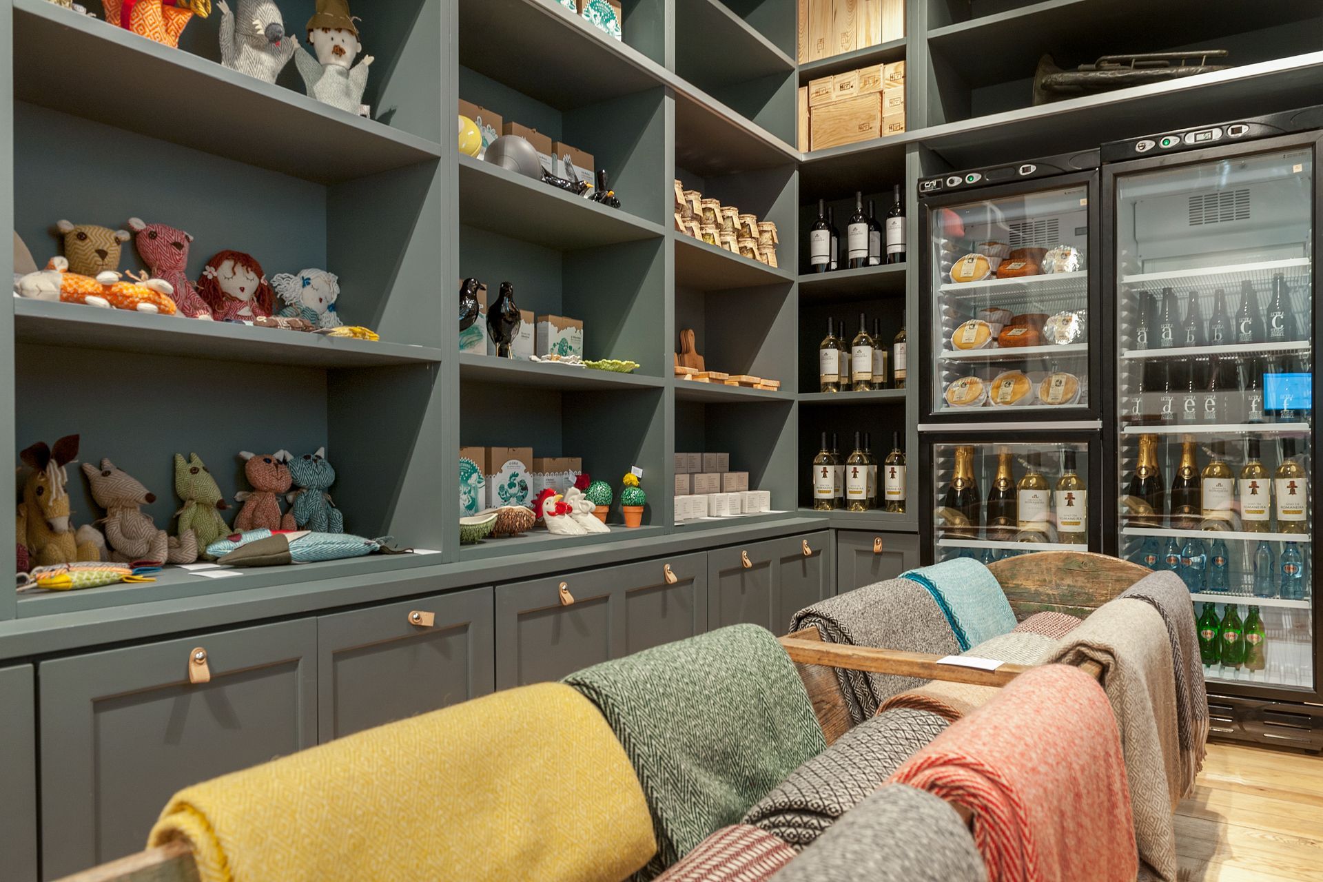 A store filled with lots of shelves and blankets. Cheese & Wine Store. Lisbon.