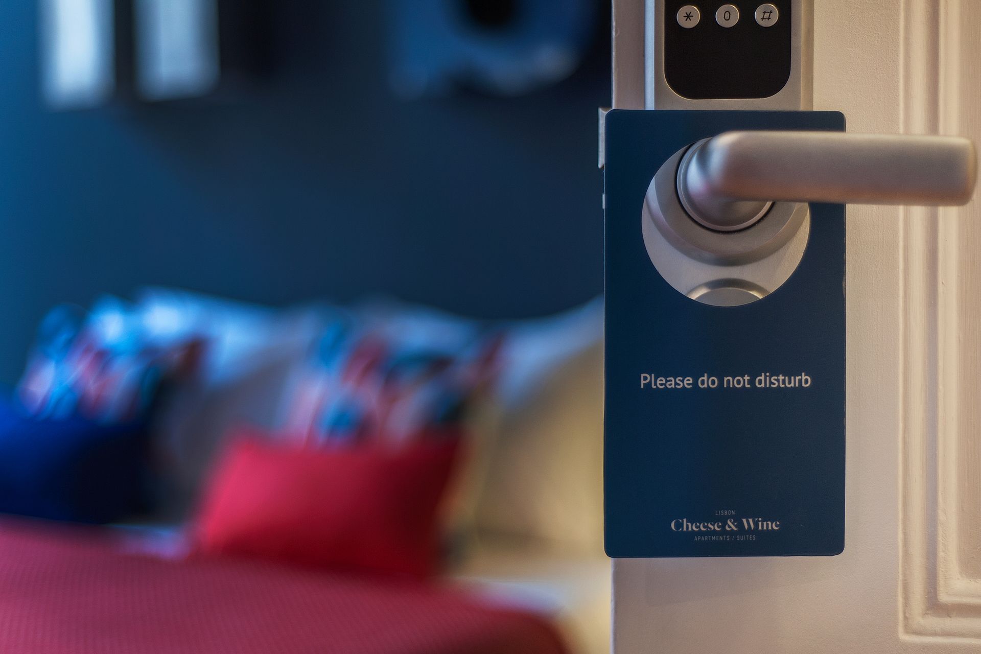 A hotel door with a sign on it that says please do not disturb. Cheese & Wiine Suites, Lapa and Apartments.