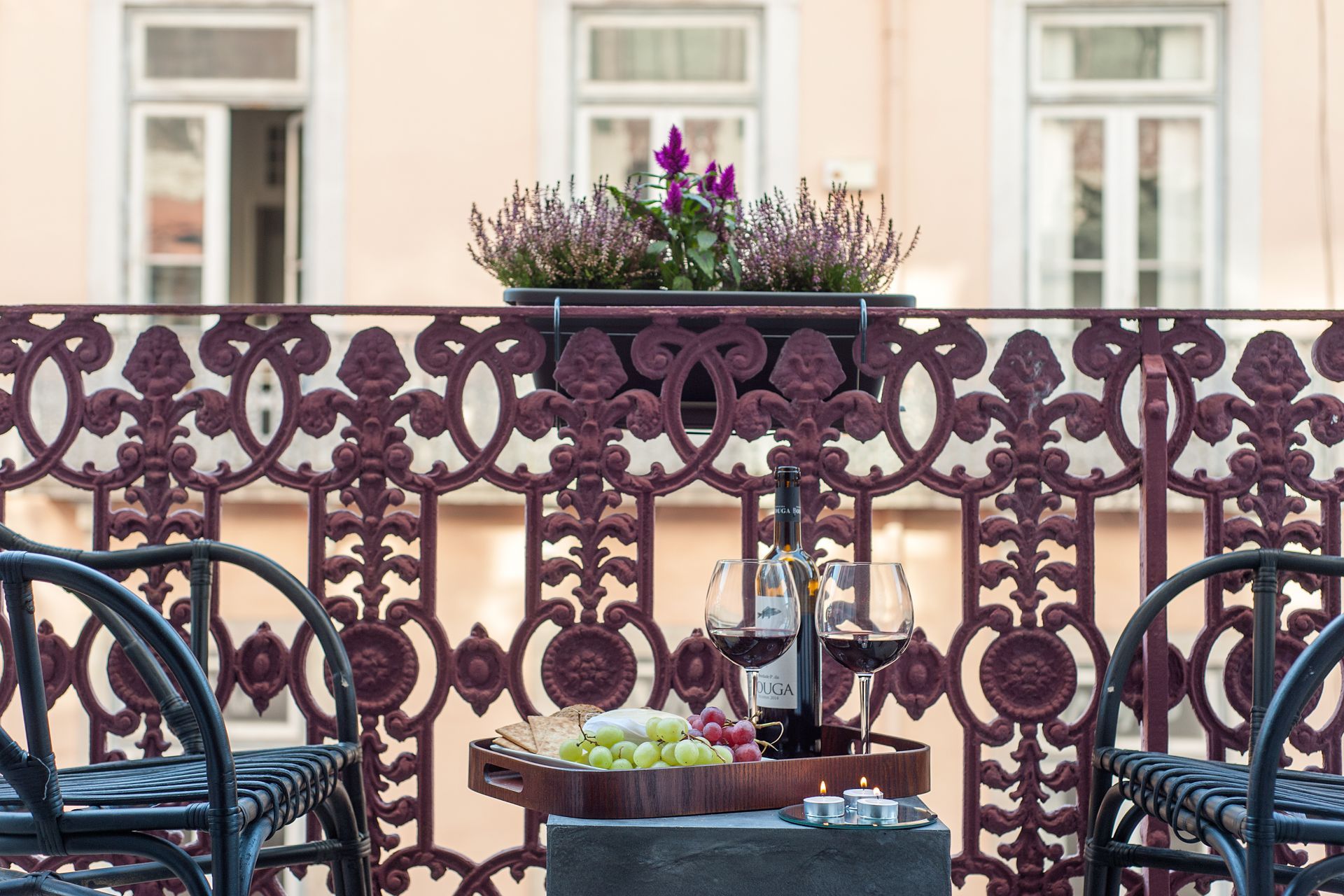 Bright and spacious room at Cheese & Wine Suites, featuring a cozy private balcony—perfect for enjoying the sunlight and relaxing in comfort.