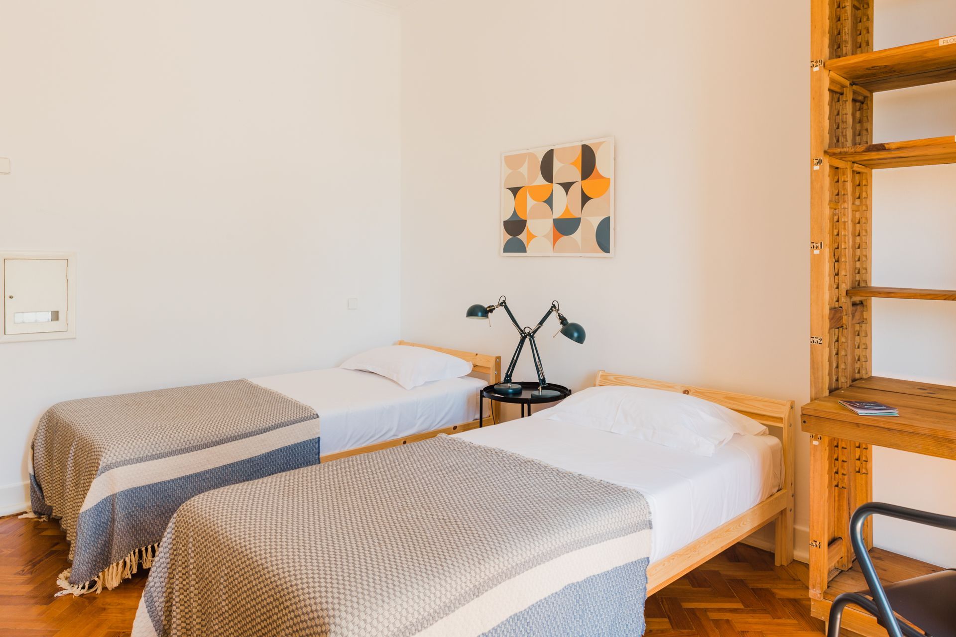 Spacious and sun-drenched rooms at Cheese & Wine Lapa, designed for ultimate comfort and relaxation.