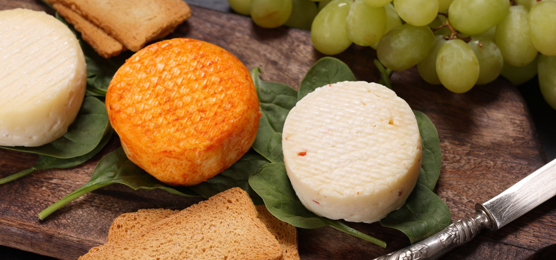 A selection of traditional Portuguese cheeses, showcasing rich textures and flavours from different regions.