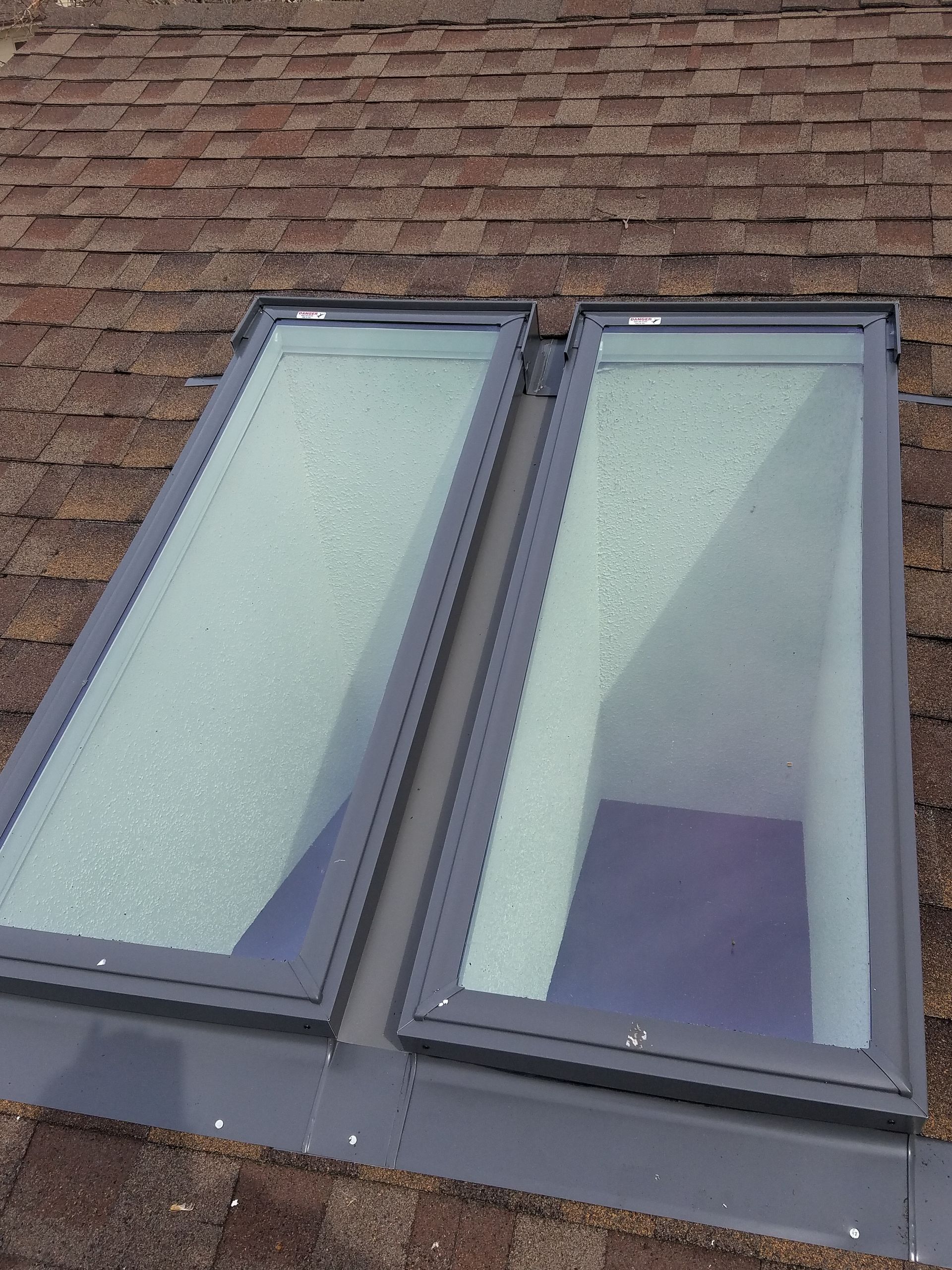 A skylight on the roof of a house