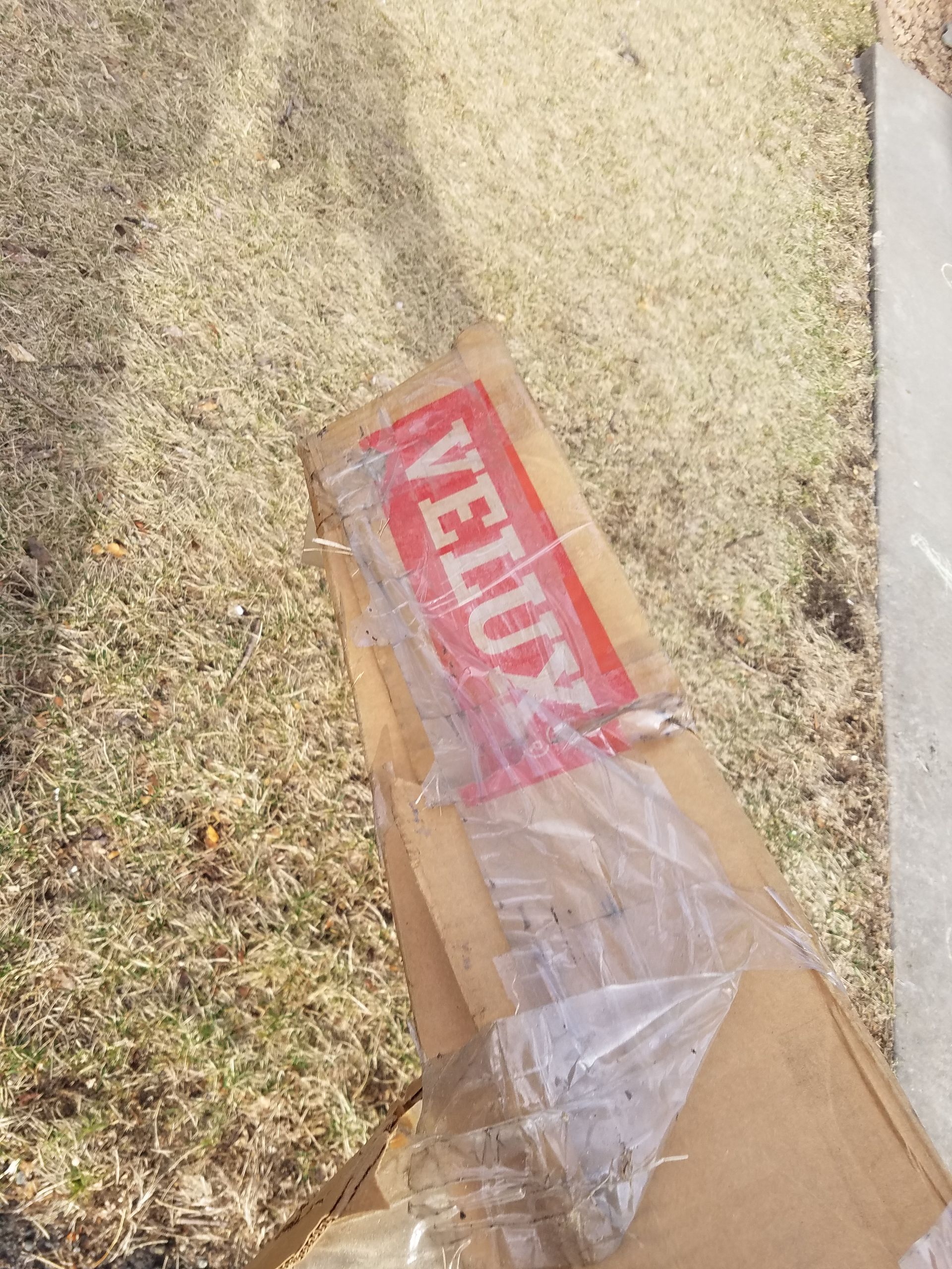 A piece of cardboard with the word velux on it