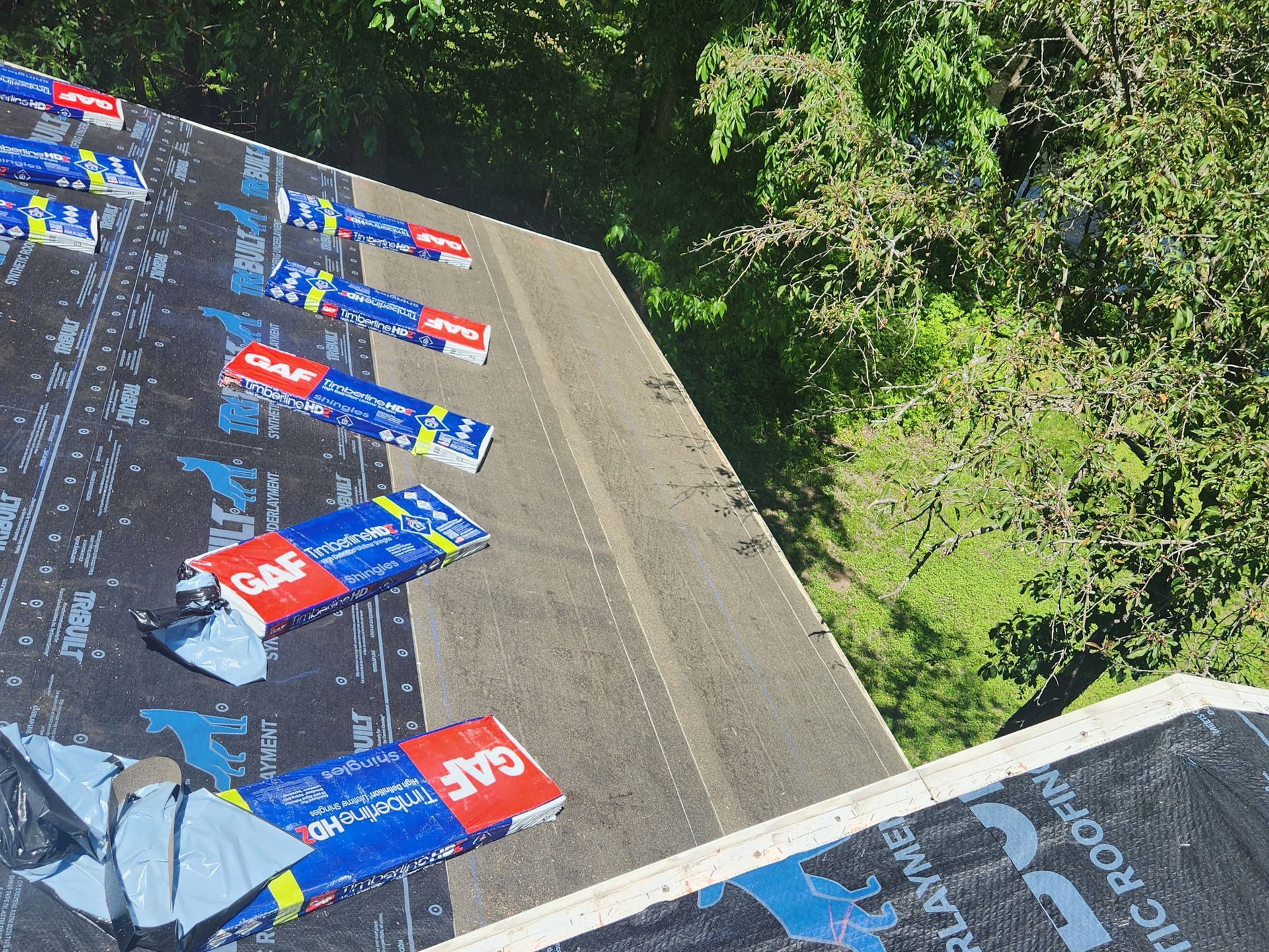 A roof with a lot of roofing materials on it
