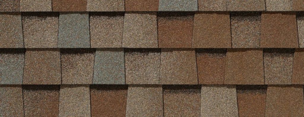 A close up of a roof with shingles on it.