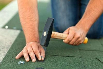 Contractor Installing a Shingle Roof