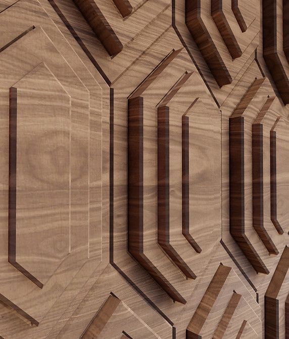 A close up of a wooden wall with a geometric pattern.