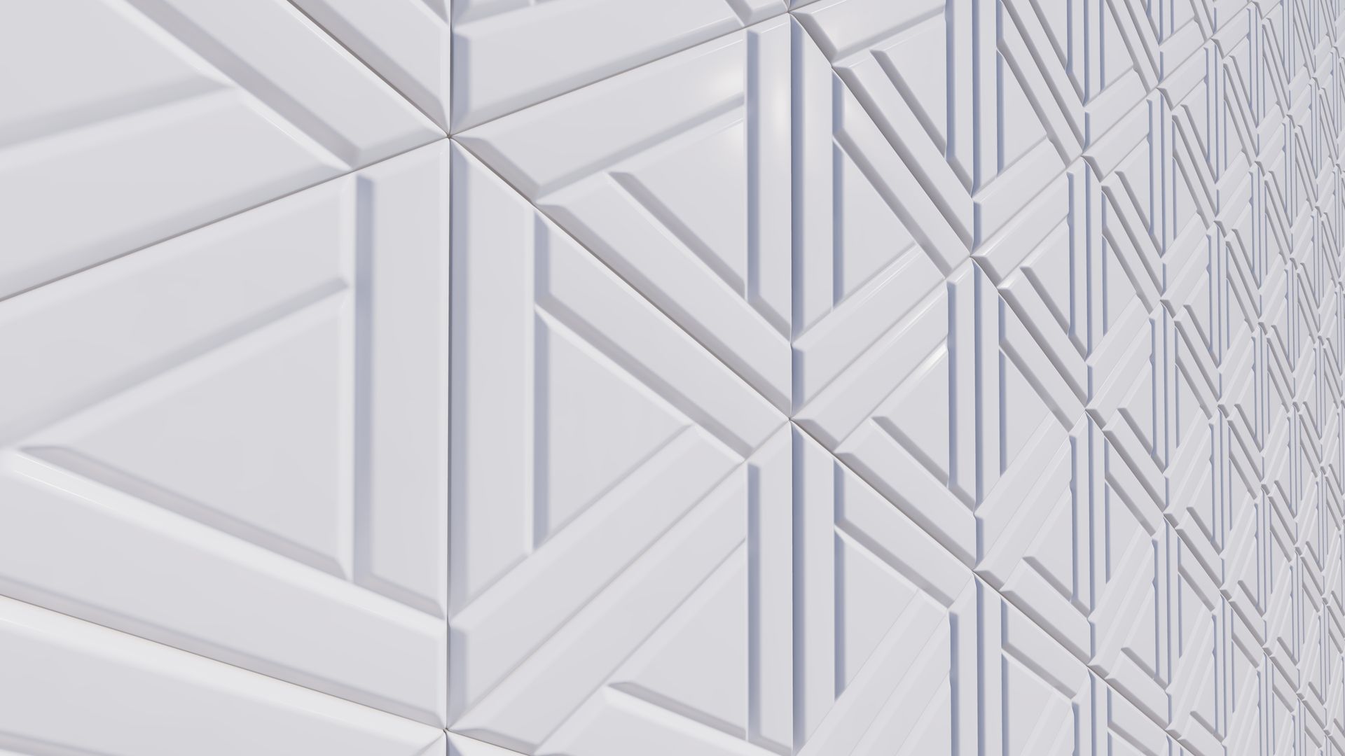 A close up of a white wall with a geometric pattern on it.