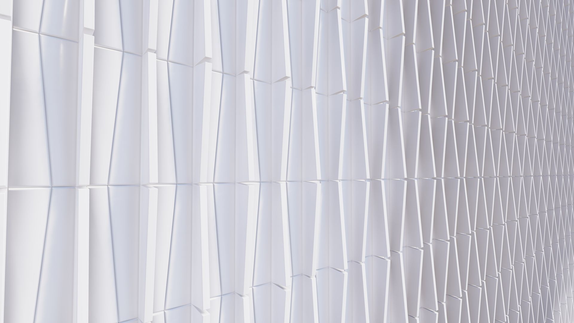 A close up of a white wall with a geometric pattern.