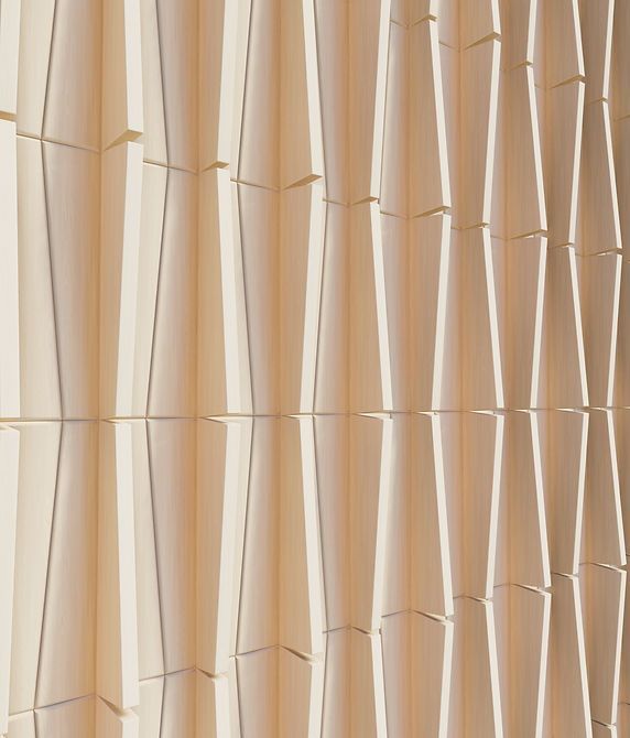 A close up of a white wall with a geometric pattern.