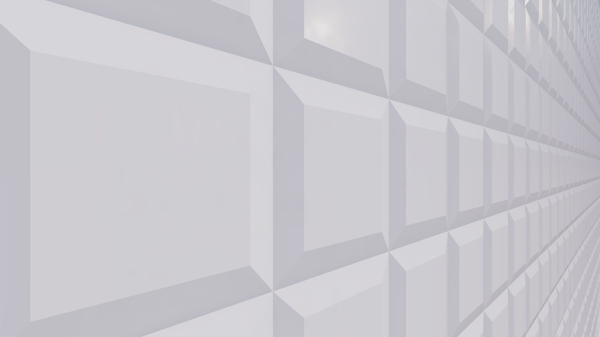 A white wall with a geometric pattern on it.