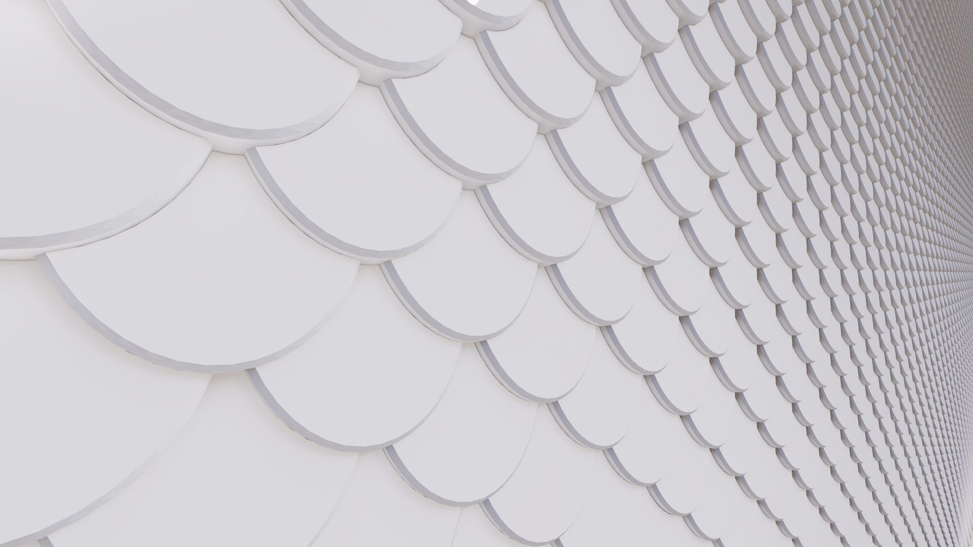 A white wall with a pattern of circles on it.