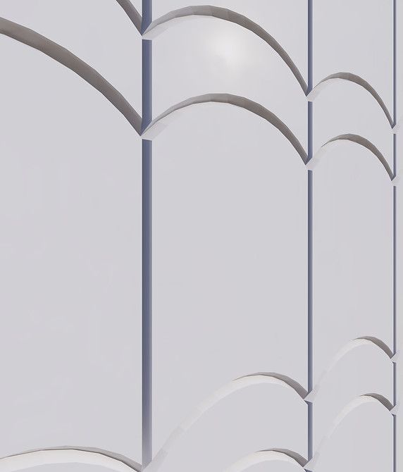 A close up of a white wall with arches on it