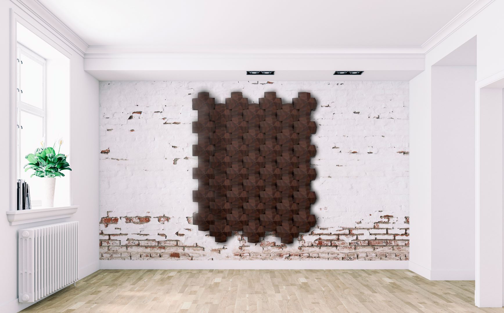 An empty room with a brick wall and a wooden floor.