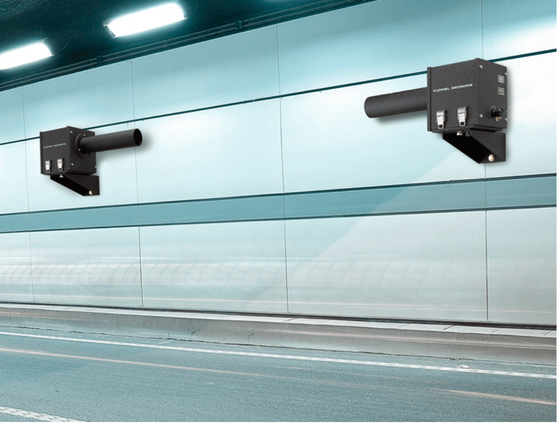 Una imagen de un túnel con una carretera al fondo.