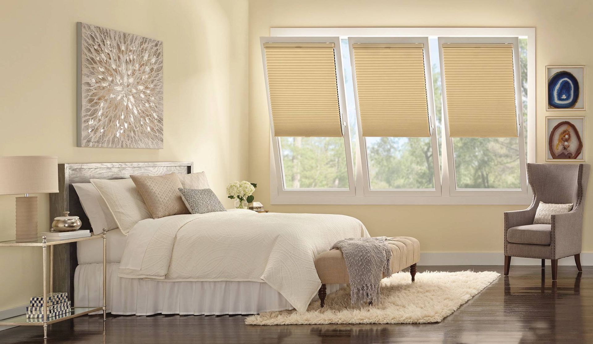 Hunter Douglas Duette® Cellular Shades covering three tilt and turn windows in a bedroom near Austin, TX