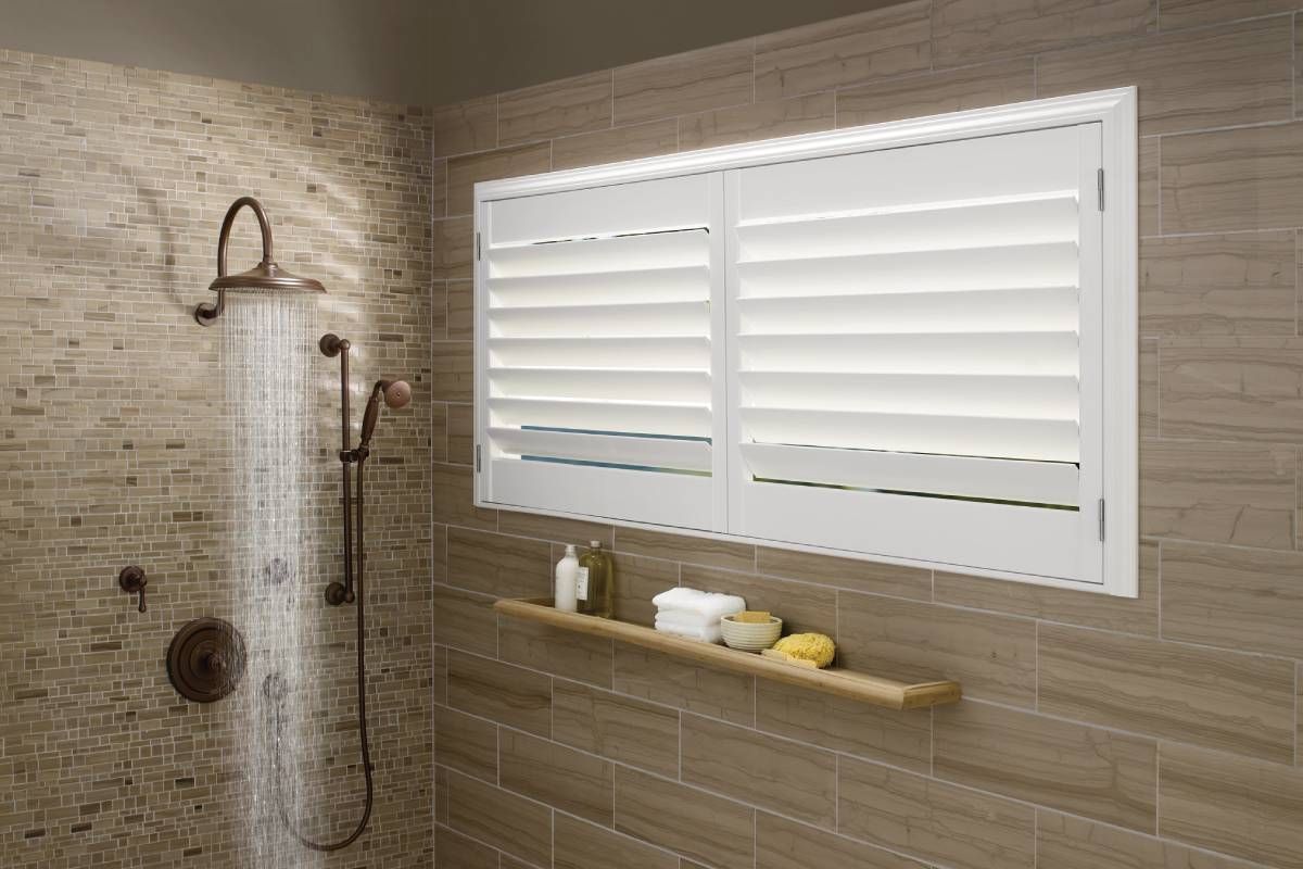 Hunter Douglas bathroom window treatments in a home near Spicewood, TX