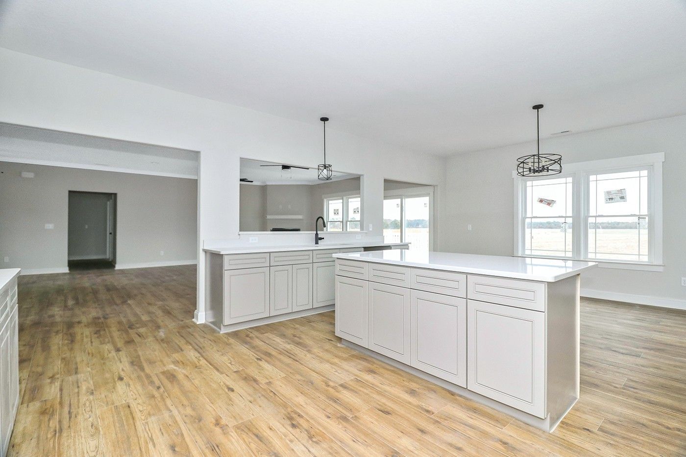 There is a large island in the middle of the kitchen.