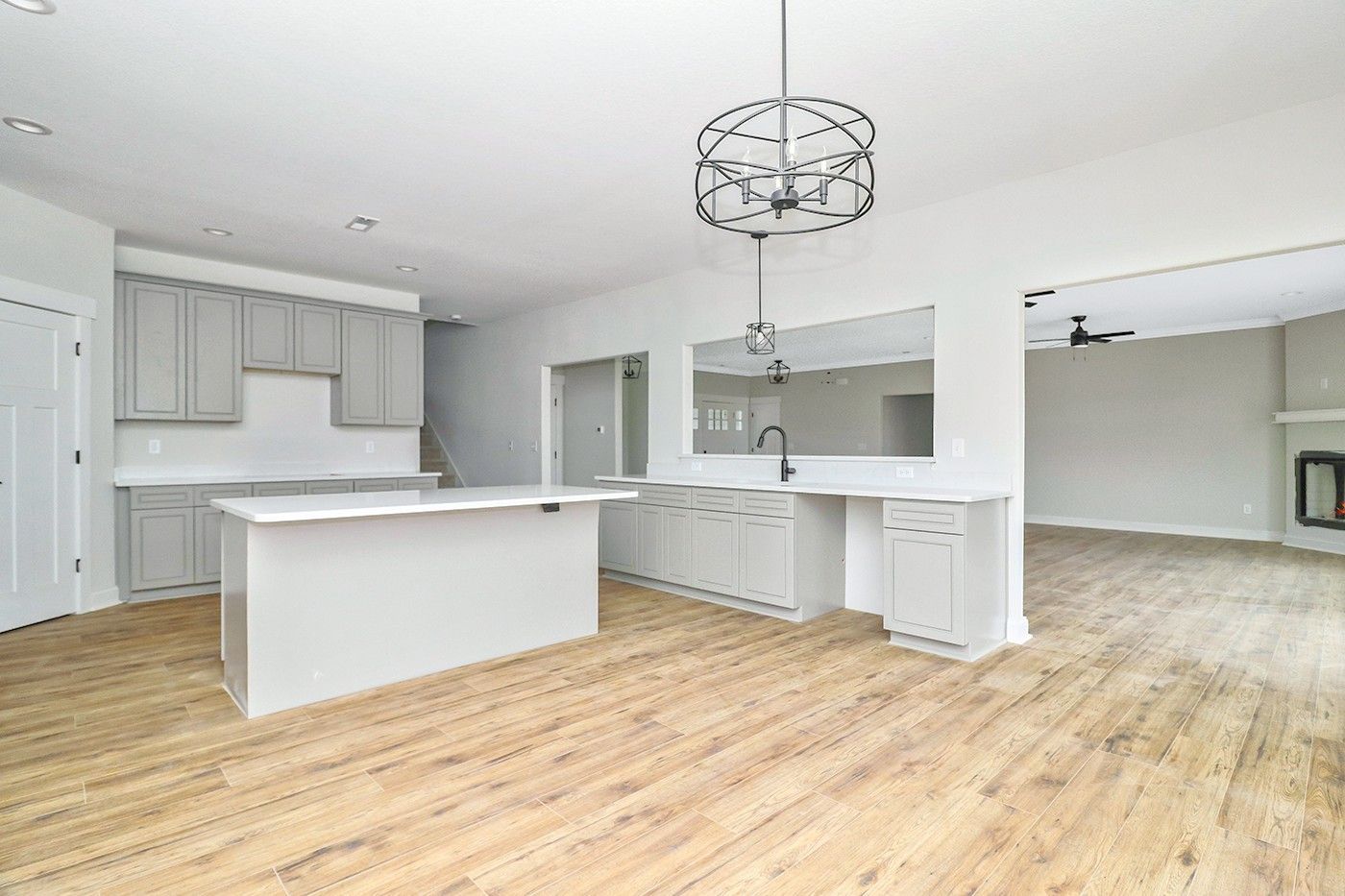 There is a large island in the middle of the kitchen.