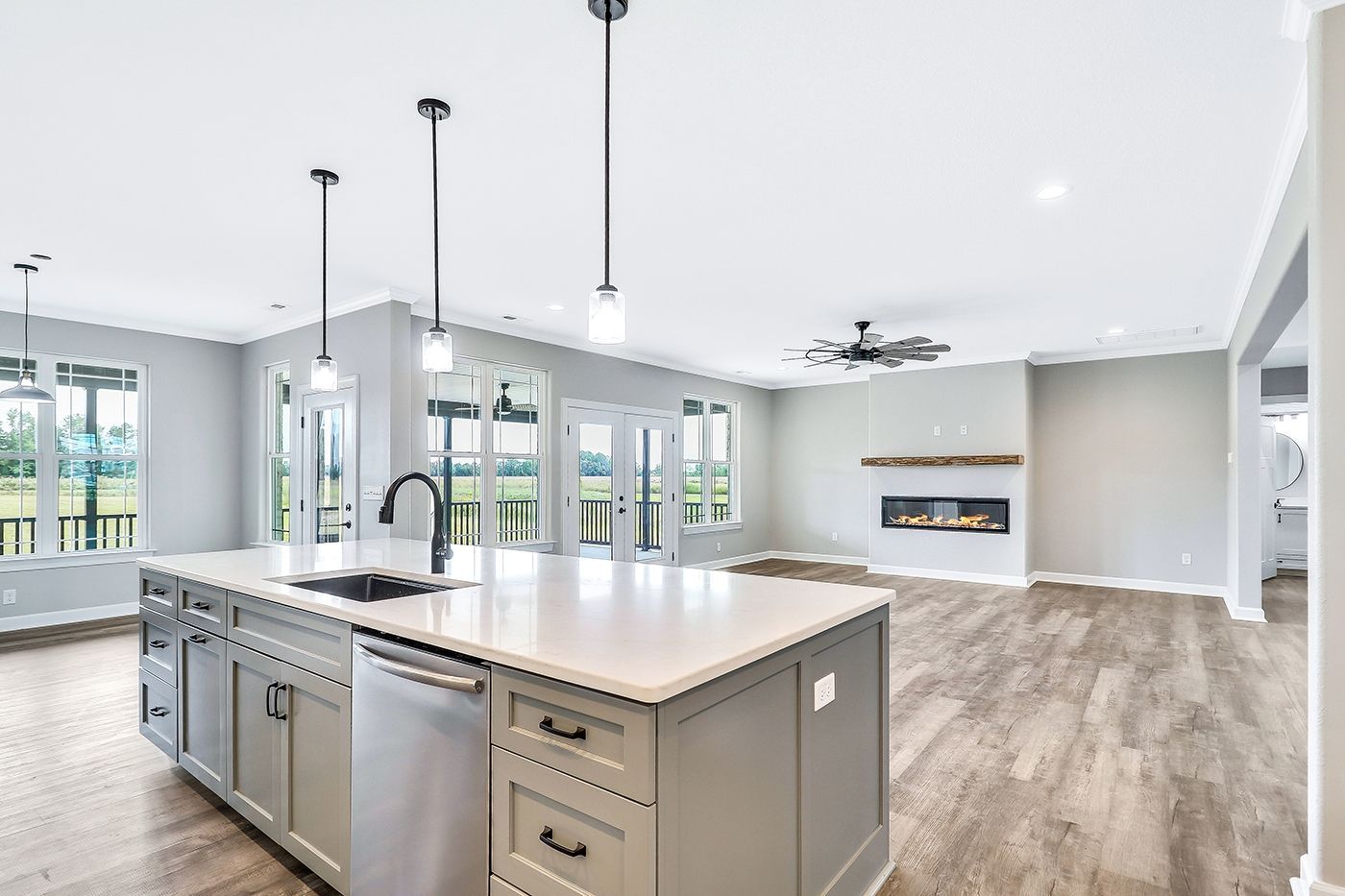 There is a large island in the middle of the kitchen.
