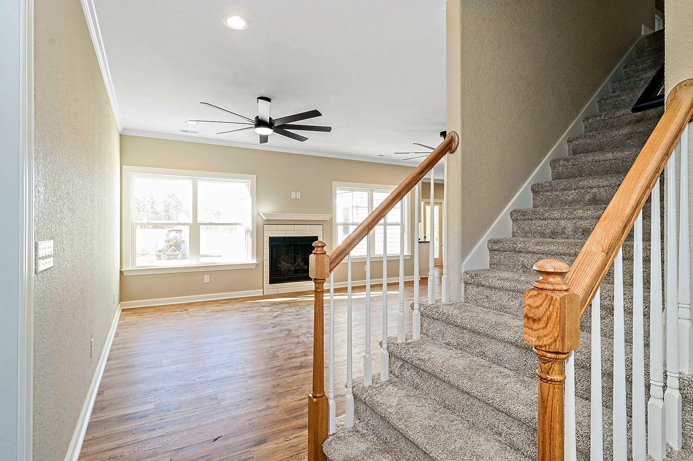 There is a staircase leading up to the second floor of a house.