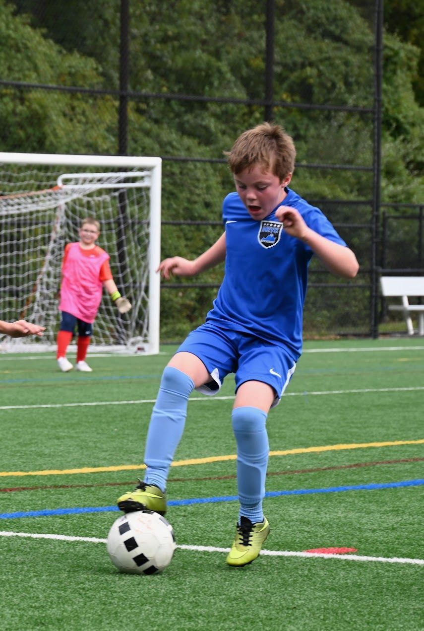Youth player from BRYC Academy playing soccer