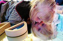 Young girl playing in open