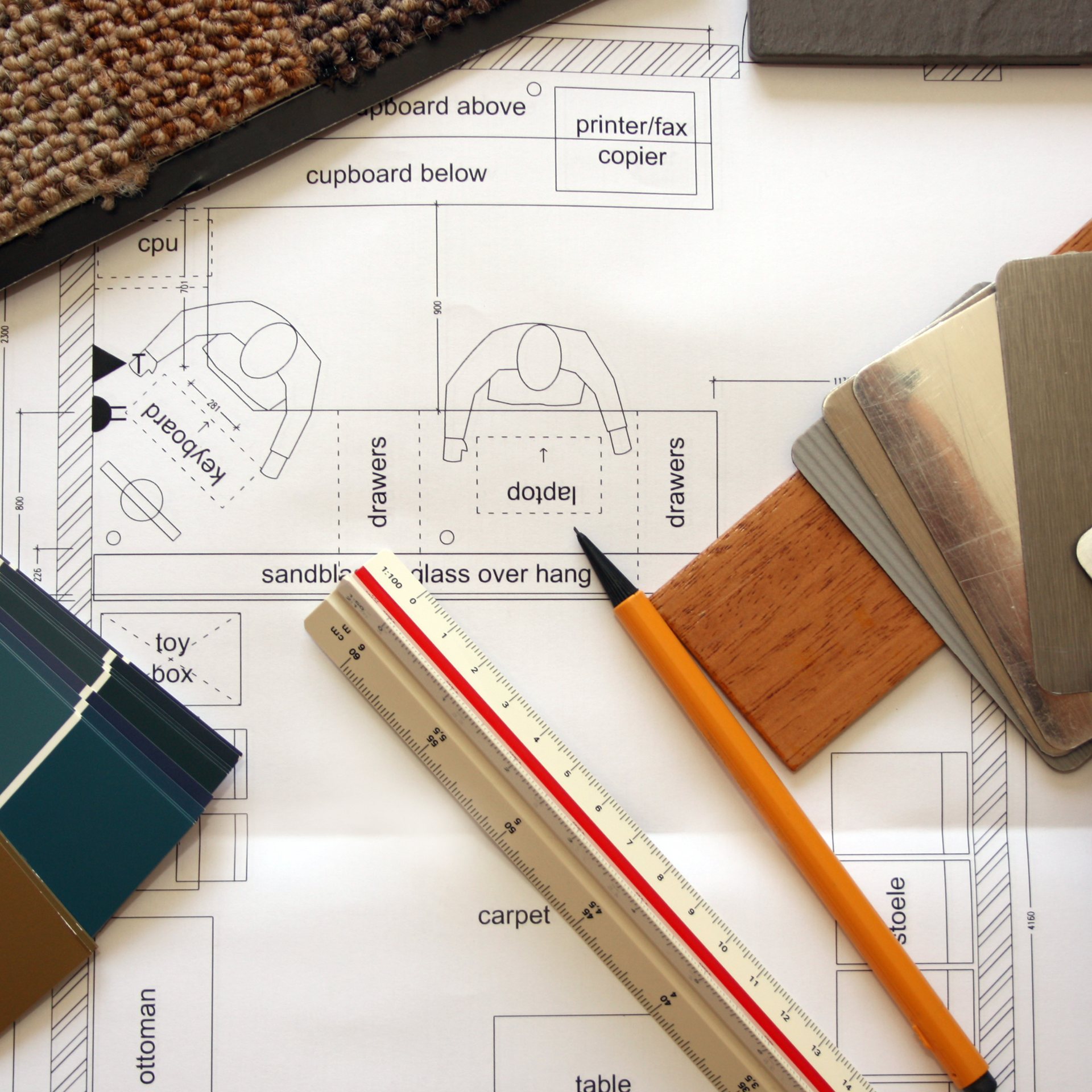 A ruler and pencil on top of a blueprint that says drawers