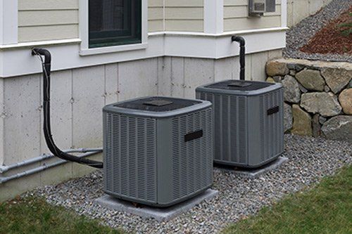 HVAC System Outside the House — Fresno, CA — Art Douglas Plumbing Inc.