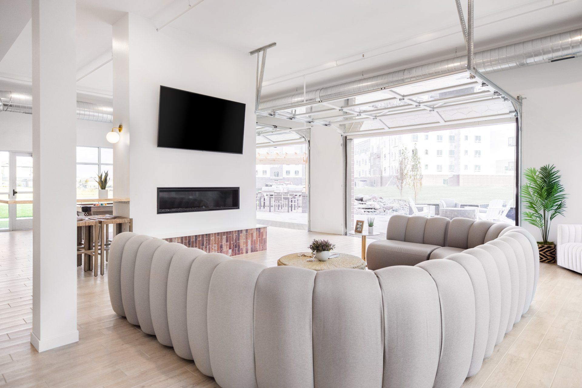 Community room with couch facing TV
