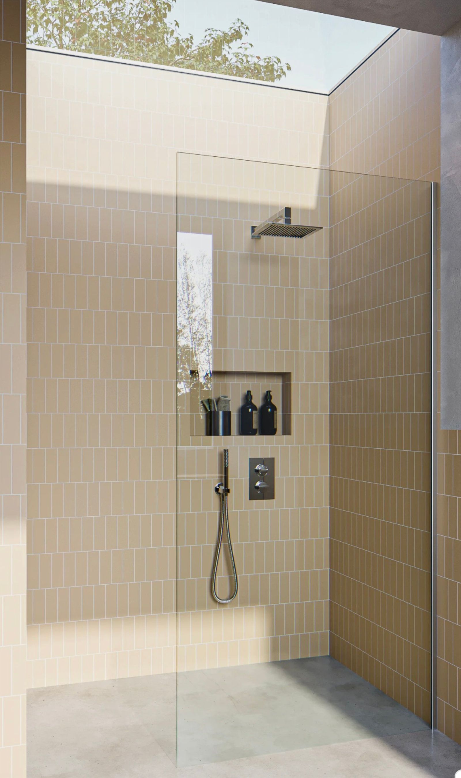 Shower with tan tiled walls, glass door, dark shower head, and recessed shelf — Cessnock Glass in Lake Macquarie, NSW