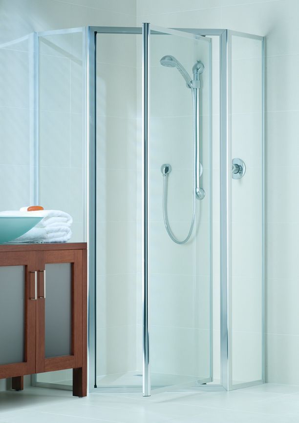 Corner shower with glass doors, chrome frame, and white walls. Next to a wooden vanity — Cessnock Glass in Hunter Valley, NSW