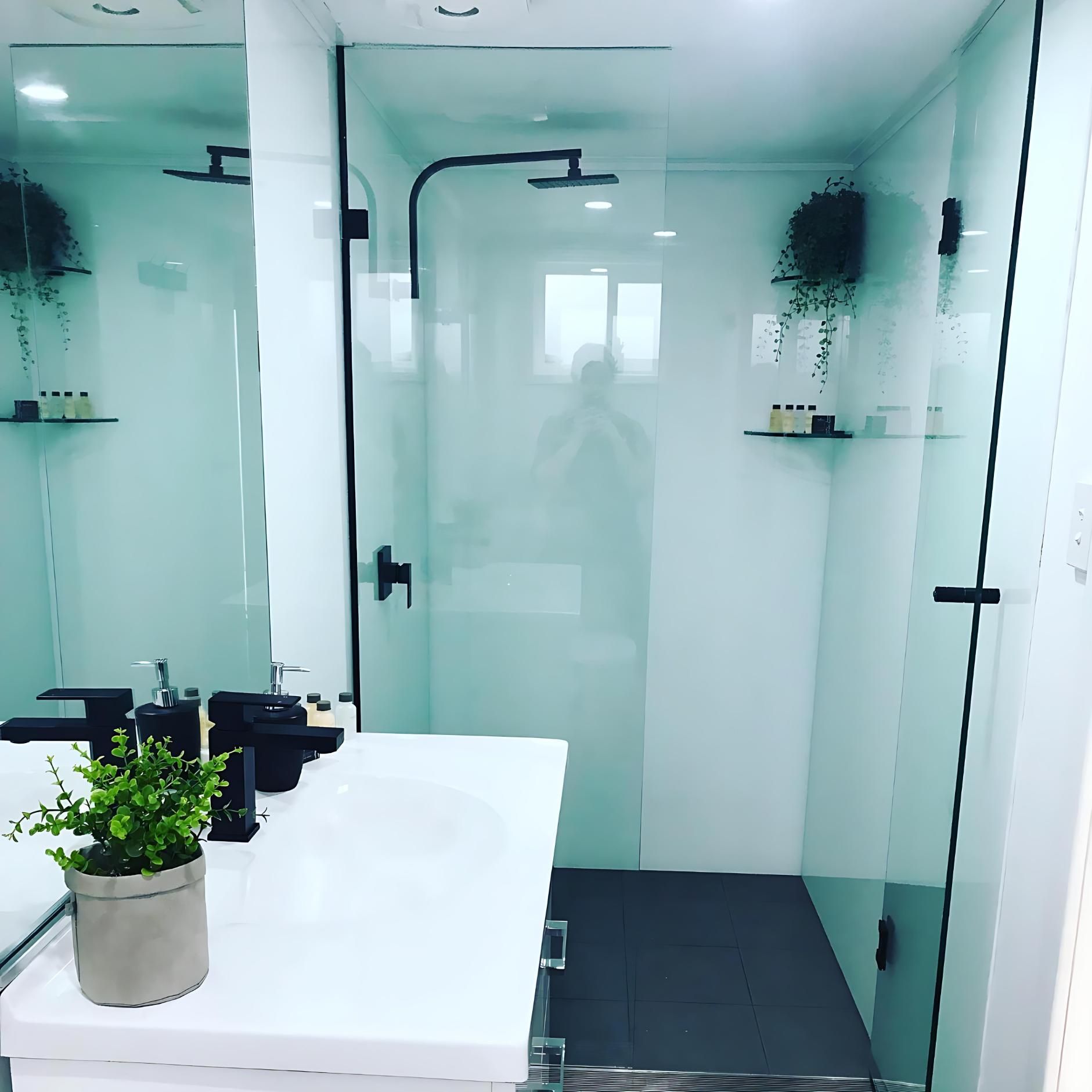 A Bathroom With a Sink and a Walk in Shower — Cessnock Glass in Port Stephens, NSW