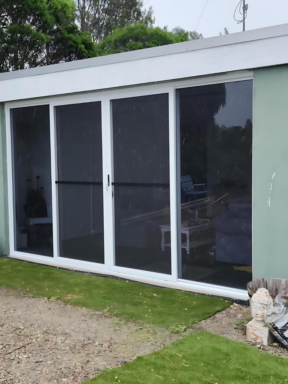 A House With a Lot of Windows and Sliding Glass Doors — Cessnock Glass in Hunter Valley, NSW
