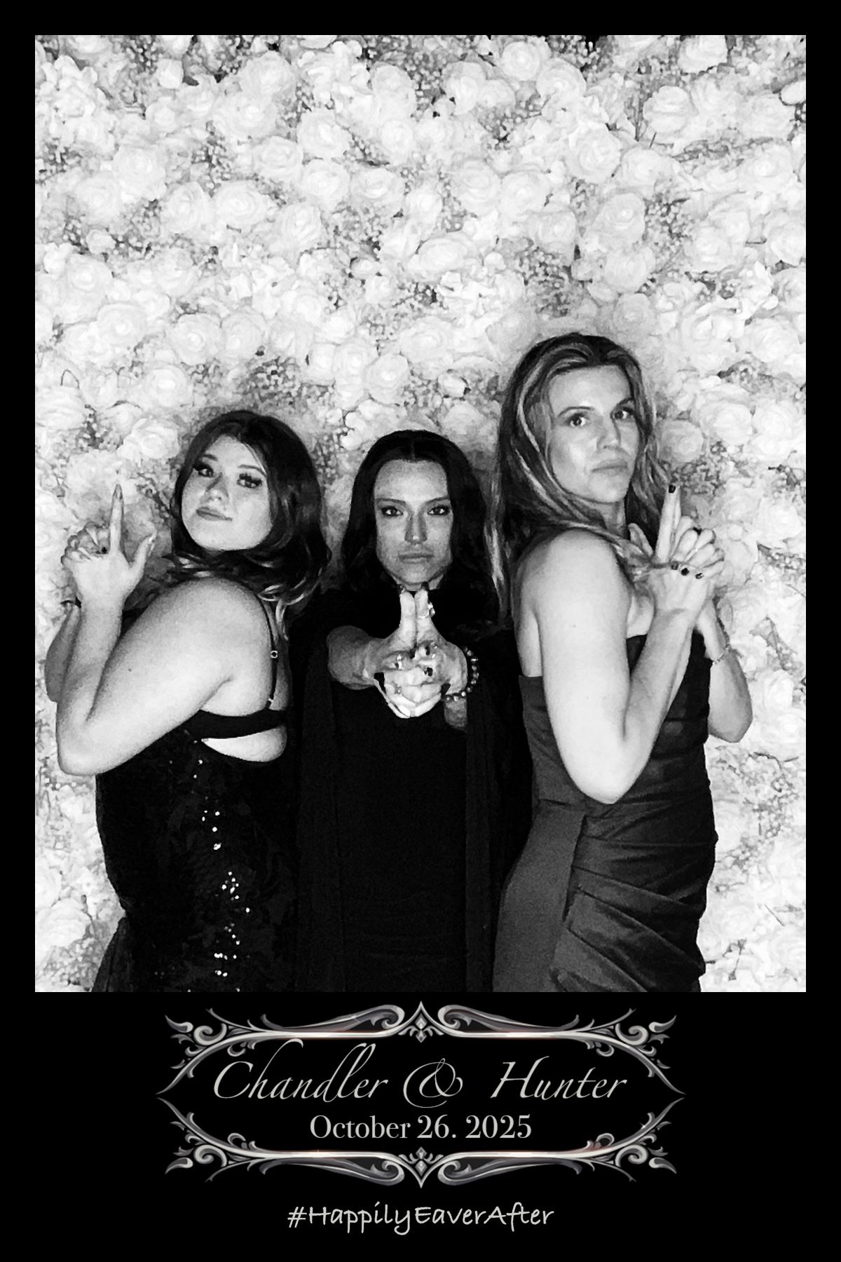 party guests posing for photo booth