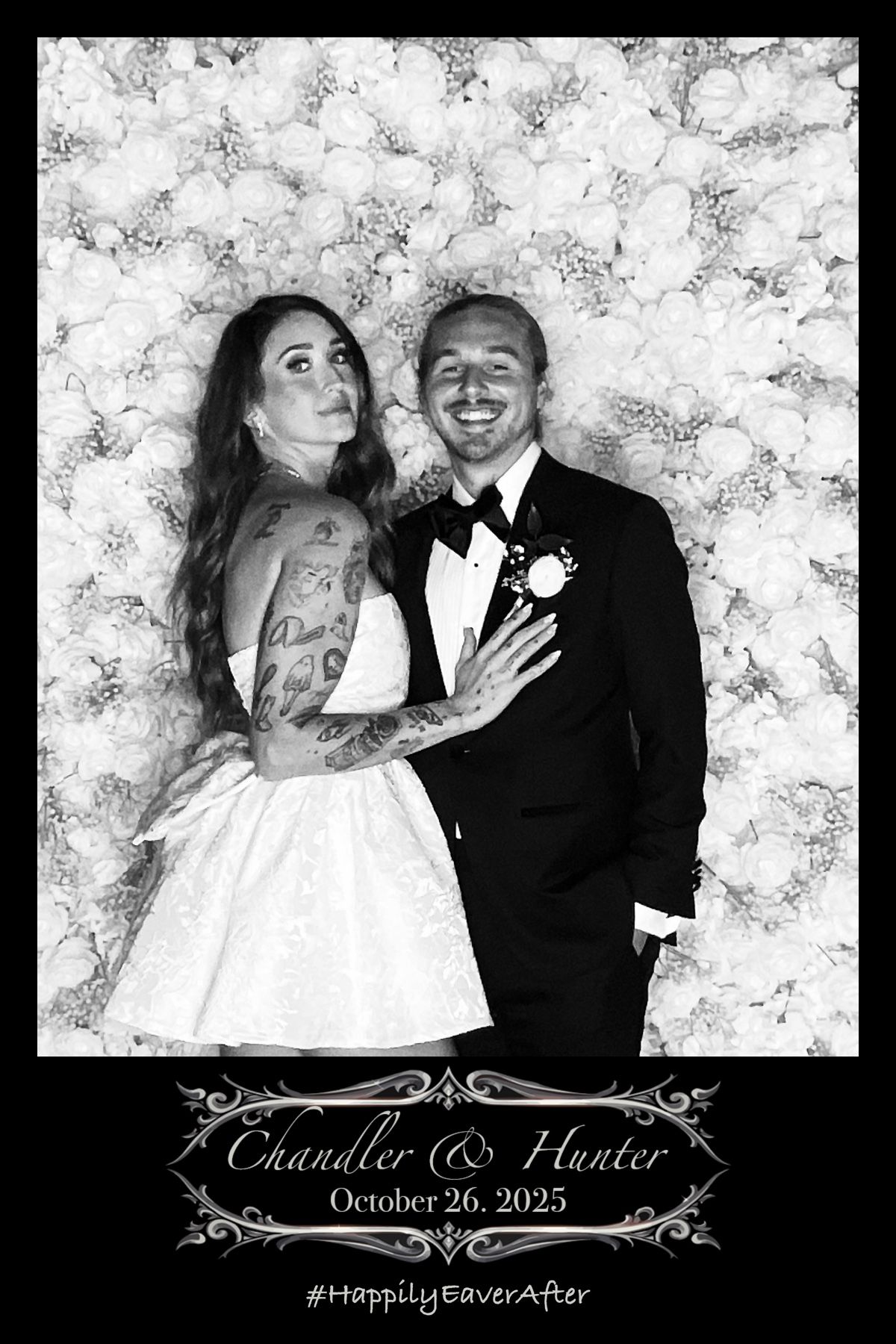 couple smiling for photo at wedding