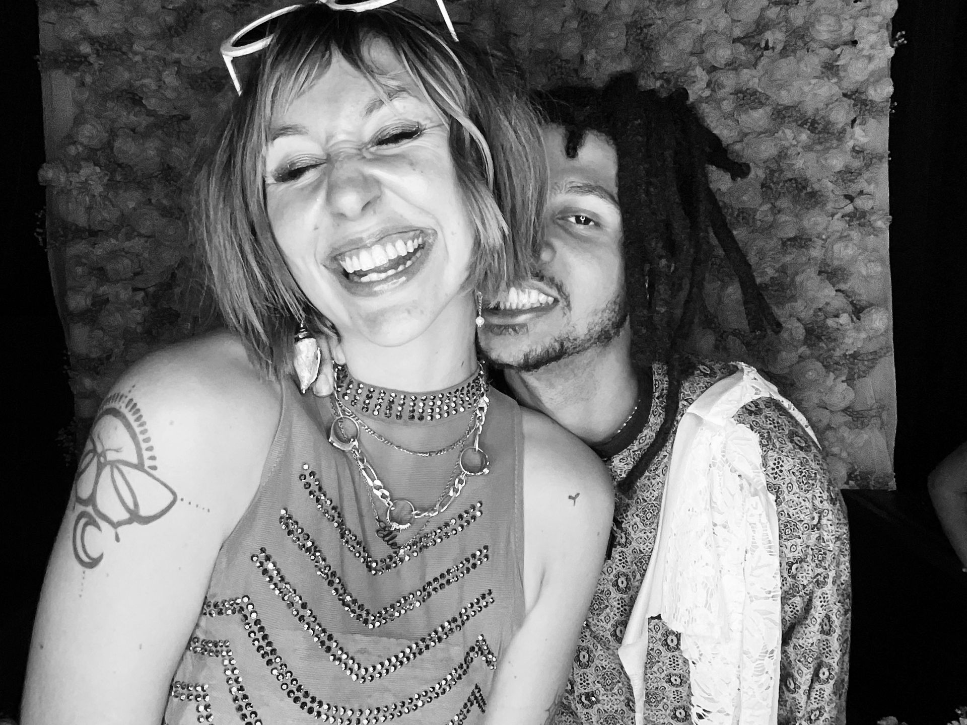 couple smiling in photo booth