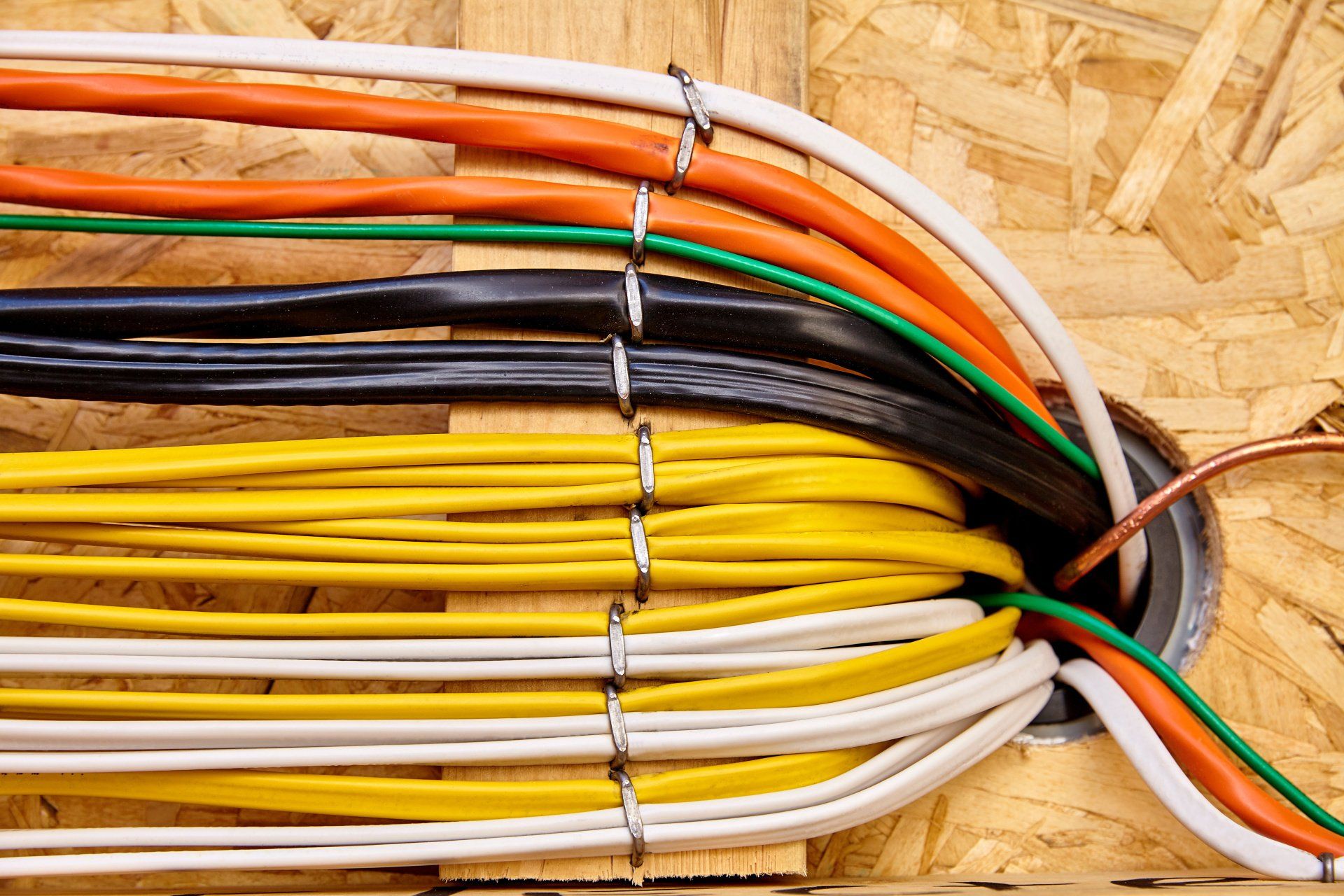 Electrical branch circuit wiring in the construction building industry, showcasing organized and labeled wiring connections for efficient power distribution within the structure.