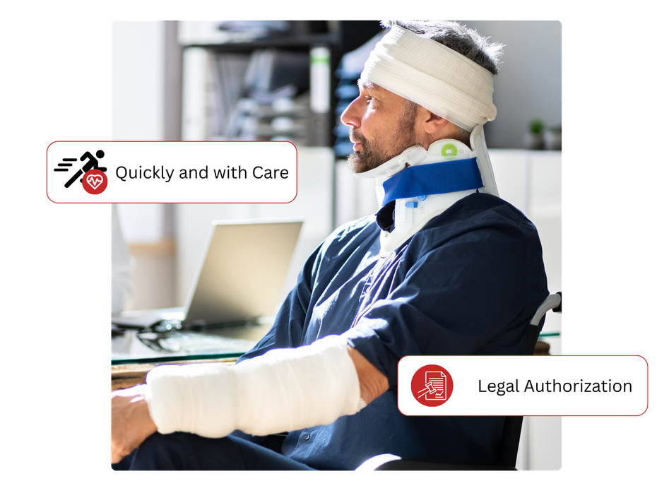 A man with a bandaged head and arm is sitting in front of a laptop computer.